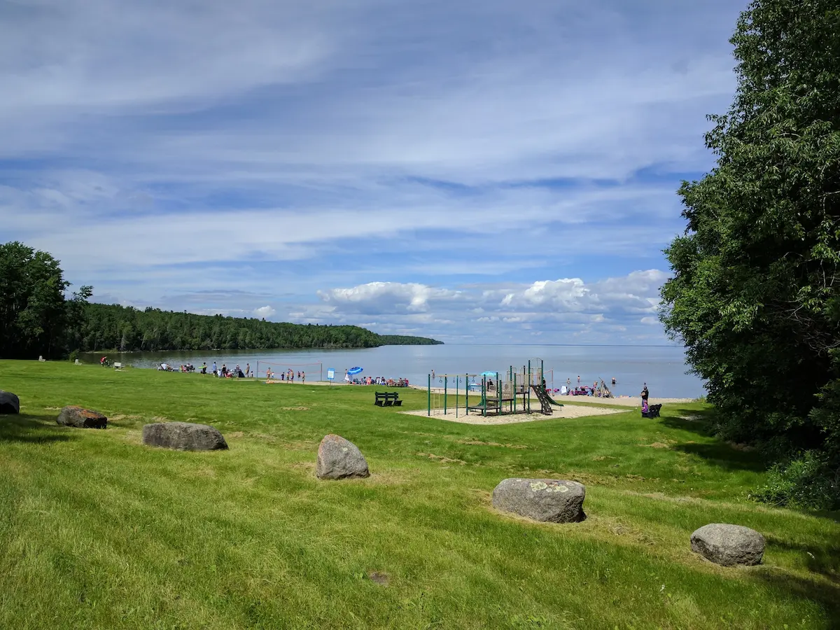 Little Grindstone Beach — sand and shallow water.